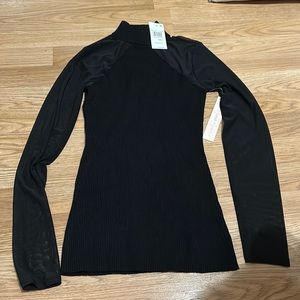 NEW. cute shirt long sleeve. Size small